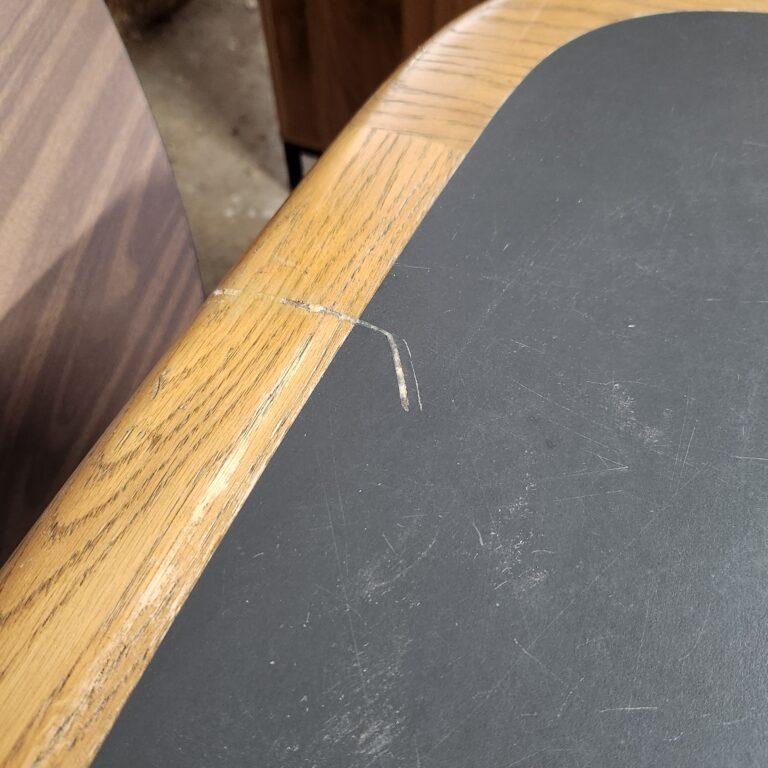 view of scratch at one end of 10' two-tone conference table