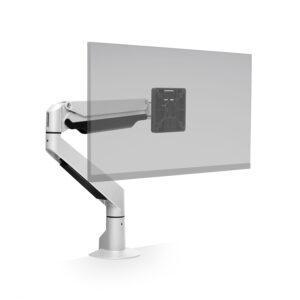 A white HAT Design Works E2 Dynamic Monitor Arm is shown in a studio product shot, mounted to a white surface via a circular grommet-style base. The arm features a robust, two-segment design with a lower angled support and a parallel upper dynamic segment. A black VESA mount adapter is attached to the end of the arm, supporting a large, semi-transparent glass panel that represents a single monitor. The design includes black accents along the underside of the arm segments for integrated cable management.