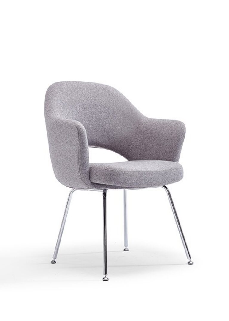 A Melanie guest seating chair with gray fabric upholstery, integrated arms, a cutout back, and four chrome legs.