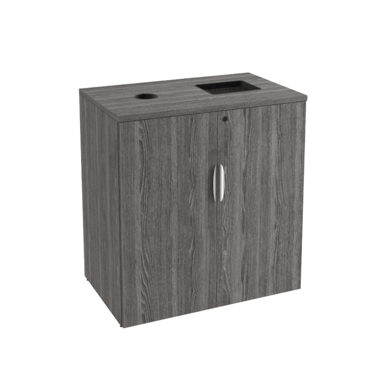 A recycling and trash storage cabinet with gray wood-grain laminate, silver handles, and two integrated waste slots on the top surface, shown against a white background.