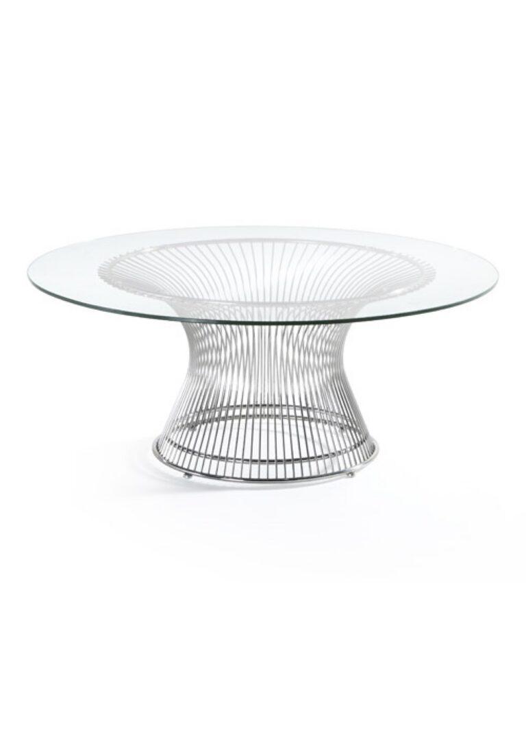 A Santana coffee table with a round glass top and a polished chrome wire base in a flared pedestal shape.