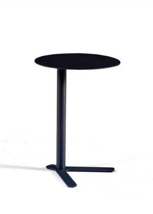 A Susie Q side table featuring a minimalist all-black design with a thin, circular tabletop and a matte finish. The off-center cylindrical support post is positioned toward one side to allow the surface to cantilever over seating, while the base consists of three flat, radiating metal legs designed for stability and a low-profile fit under furniture.